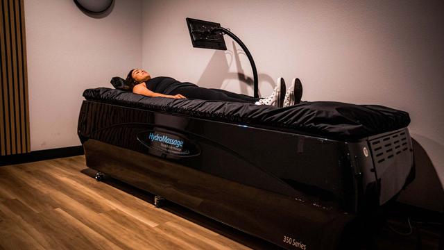 woman relaxing on HydroMassage bed