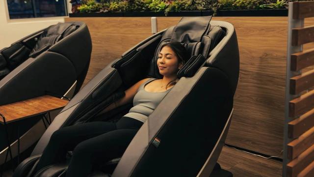women relaxing in massage chair