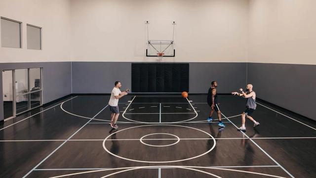men playing basketball