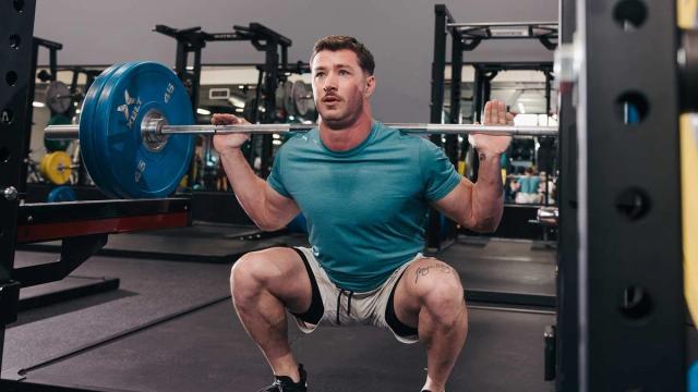 man lifting heavy weights